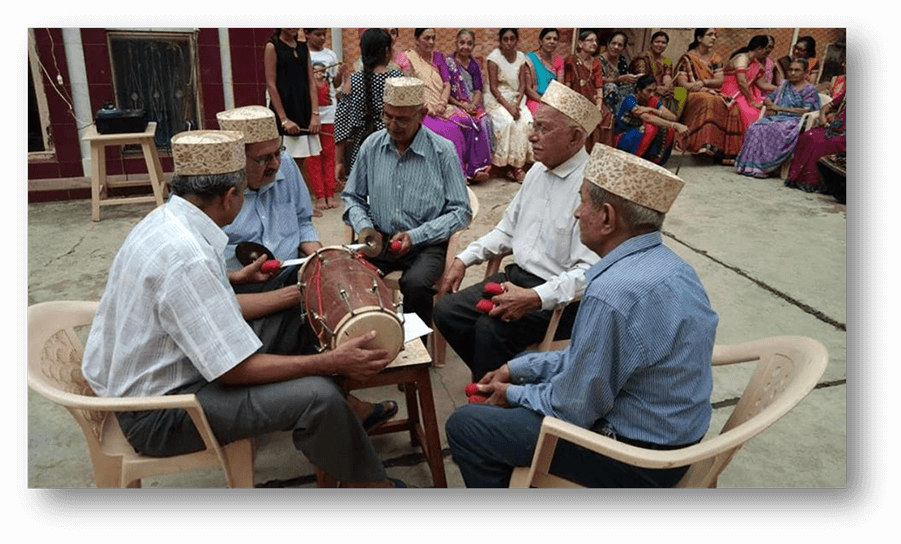 The musicians seated in the centre of the chowk